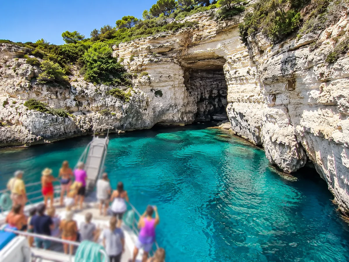 Menorca: Full-Day Boat Tour of unspoilt beaches with Paella Lunch (SIC Basis)